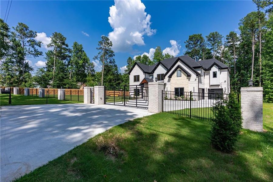 Front exterior of a new home in , Lawrenceville, GA, highlighting curb appeal (Image 44). Front exterior of a new home in , Lawrenceville, GA, highlighting curb appeal (Image 44).