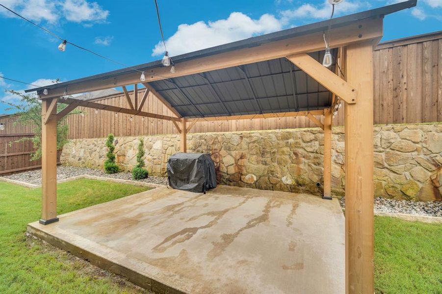 Exterior details and patio area of a home in Westside Preserve, Midlothian (Image 22).