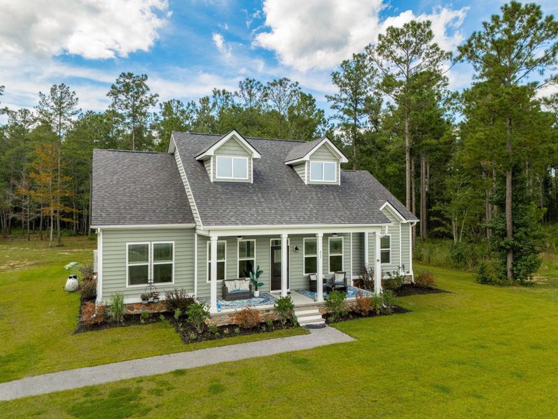 Front exterior of a new home in , Huger, SC, highlighting curb appeal (Image 20).