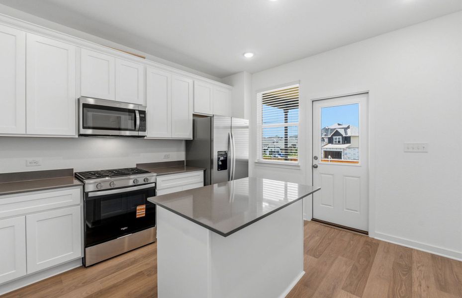 Furnished interior view inside a new home in Crosswinds, Kyle (Image 7).