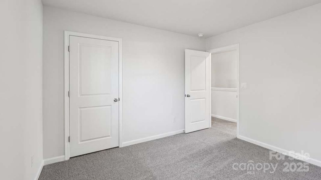 Spacious, unfurnished interior of a new home in Wallace Springs, Statesville (Image 33).