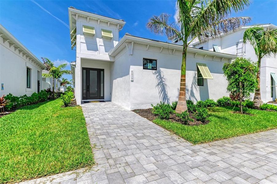 Exterior details and patio area of a home in Aqua Single Family Homes, Bradenton (Image 17). Exterior details and patio area of a home in Aqua Single Family Homes, Bradenton (Image 17).