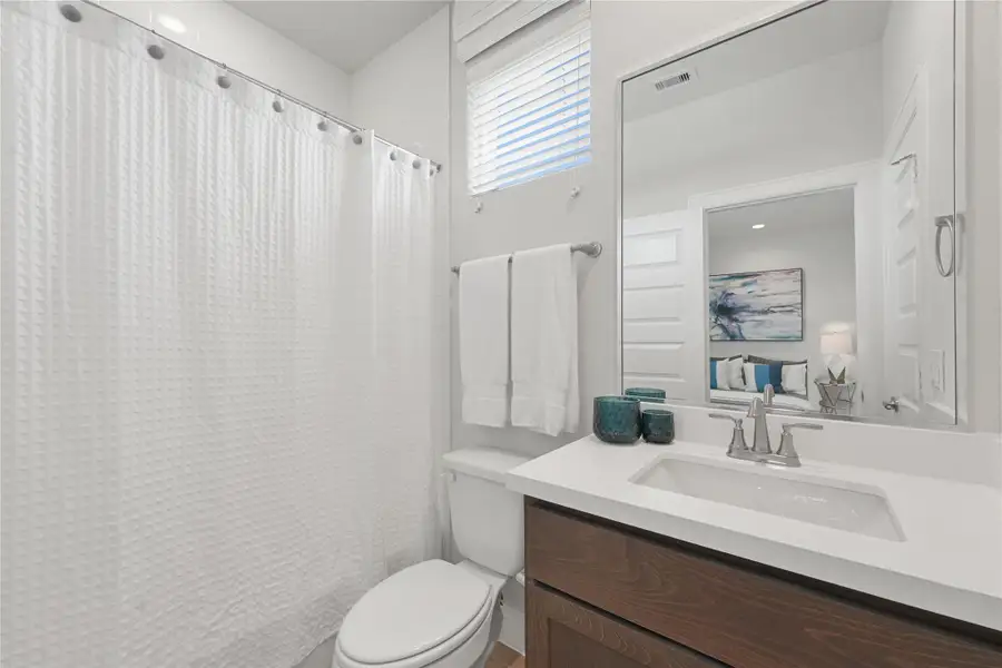 Furnished interior view inside a new home in The Corner At Buffalo Pointe, Houston (Image 2).