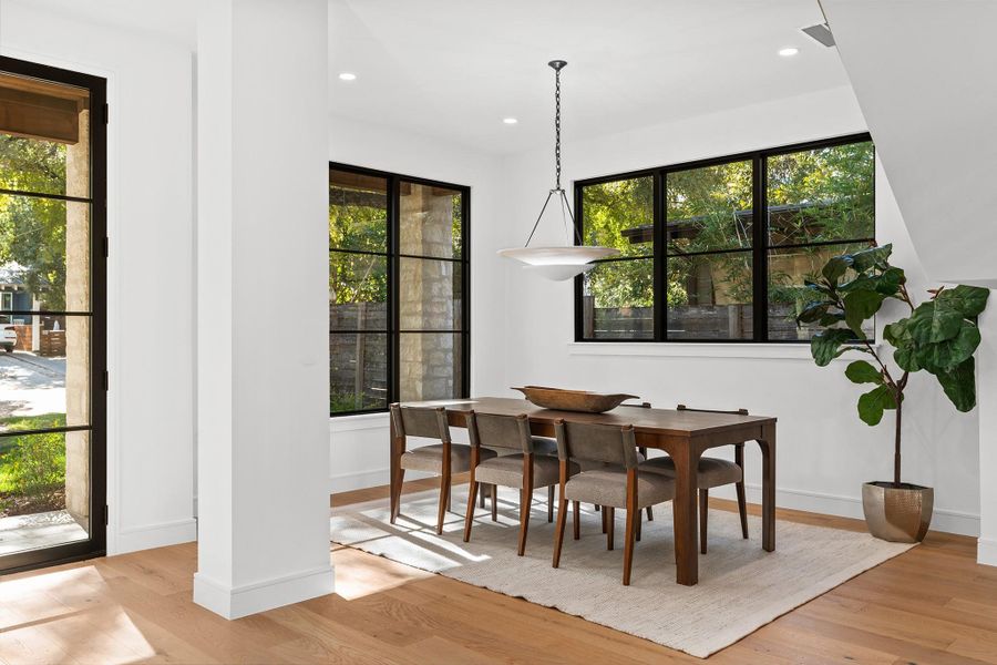 The dining room sits just adjacent to the kitchen, bordered by the front door and the stairs, it feels a space unto its own, but flows freely for entertaining.