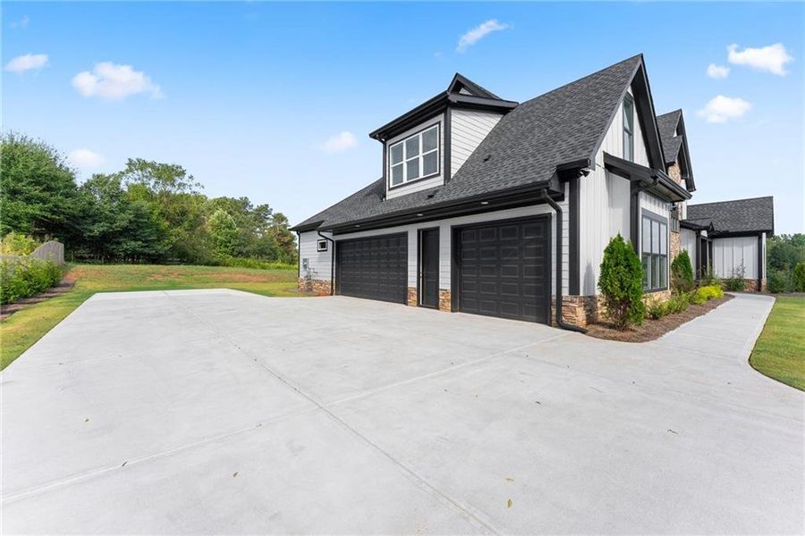 Front exterior of a new home in , Cumming, GA, highlighting curb appeal (Image 25).