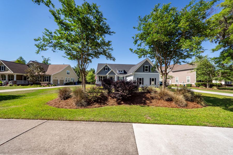 Front exterior of a new home in , Charleston, SC, highlighting curb appeal (Image 24).