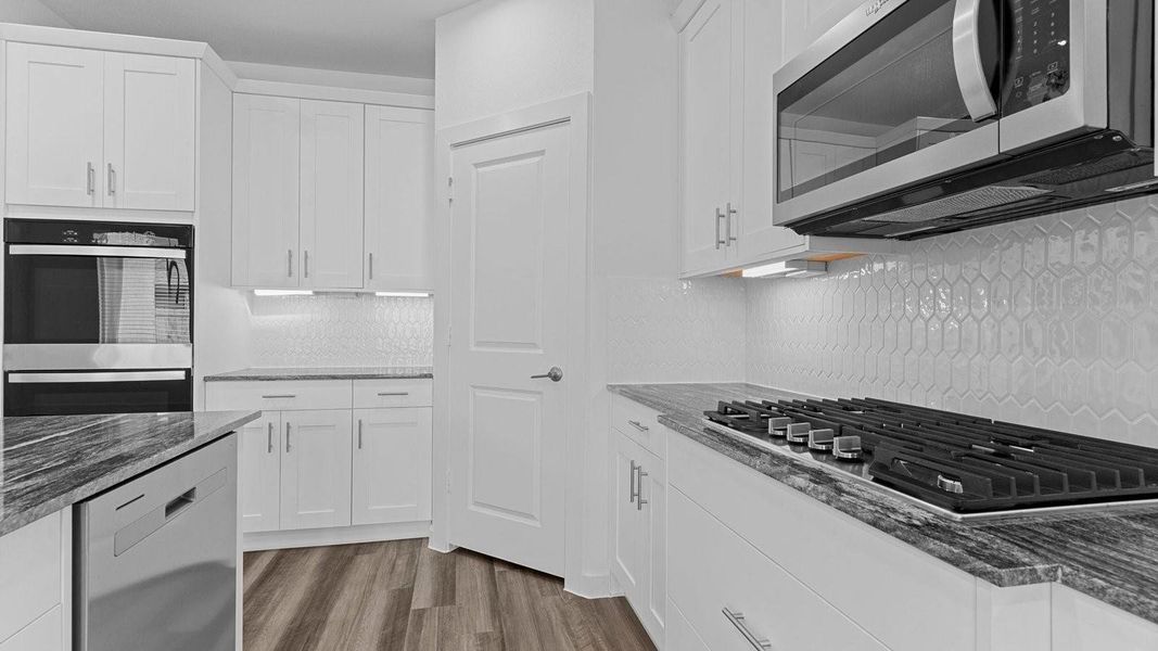 Furnished interior view inside a new home in Harvest Green, Richmond (Image 31).