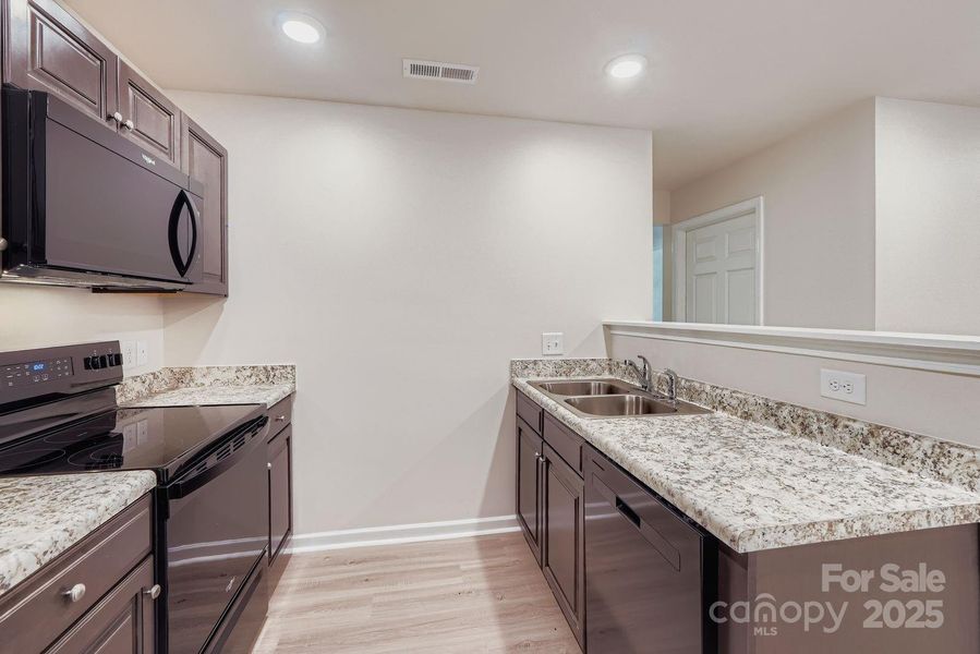 Furnished interior view inside a new home in , Charlotte (Image 7).