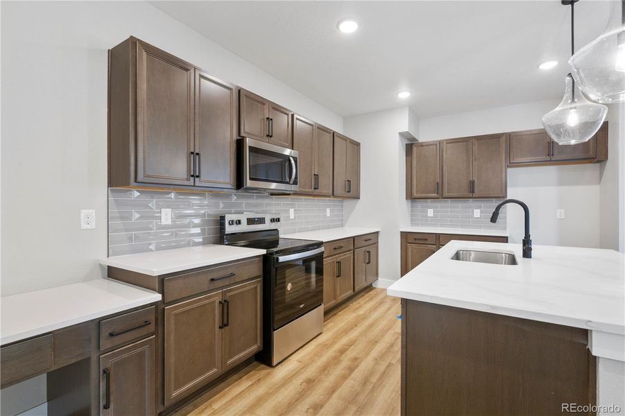 Furnished interior view inside a new home in Windler Single Family Homes, Aurora (Image 4).