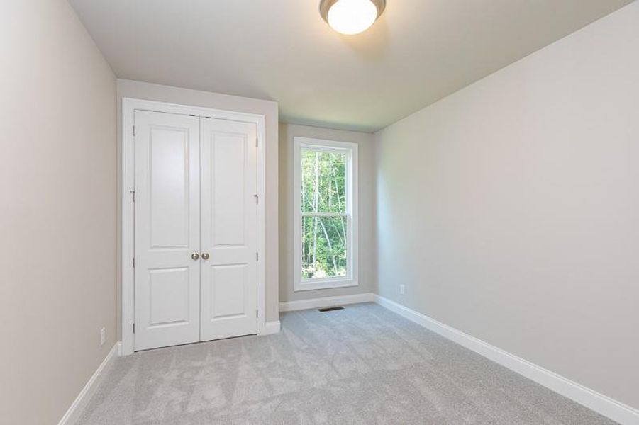 Spacious, unfurnished interior of a new home in Waterhaven, Cumming (Image 28).