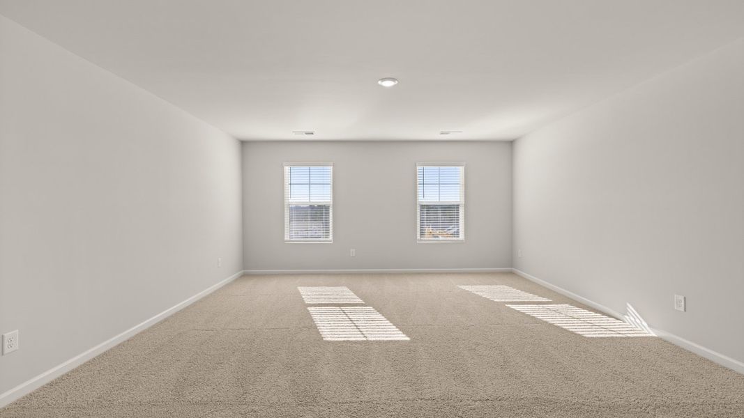 Representative unfurnished interior of a home built from the Mansfield by D.R. Horton in Southwind Village, Evans (Image 24).