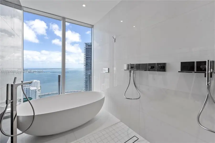 Furnished interior view inside a new home in Aston Martin Residences, Miami (Image 1).