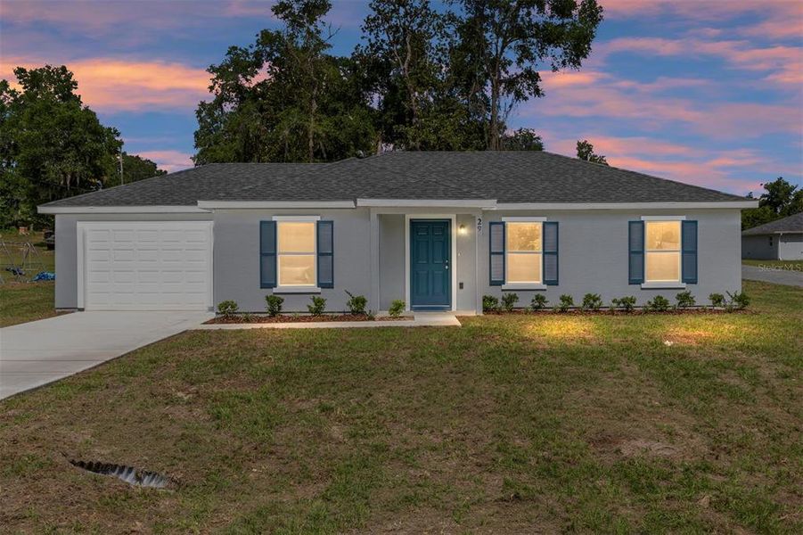 Front exterior of a new home in , Ocala, FL, highlighting curb appeal (Image 2).