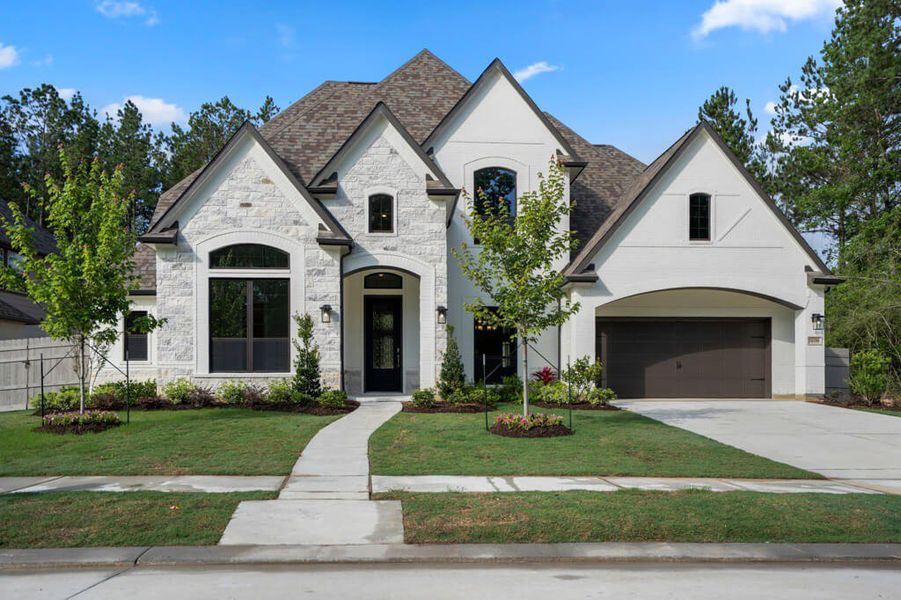 Representative exterior photo of a completed home built from the Reagan 3903 by J. Patrick Homes in Colton, Montgomery, TX (Image 4). Representative exterior photo of a completed home built from the Reagan 3903 by J. Patrick Homes in Colton, Montgomery, TX (Image 4).