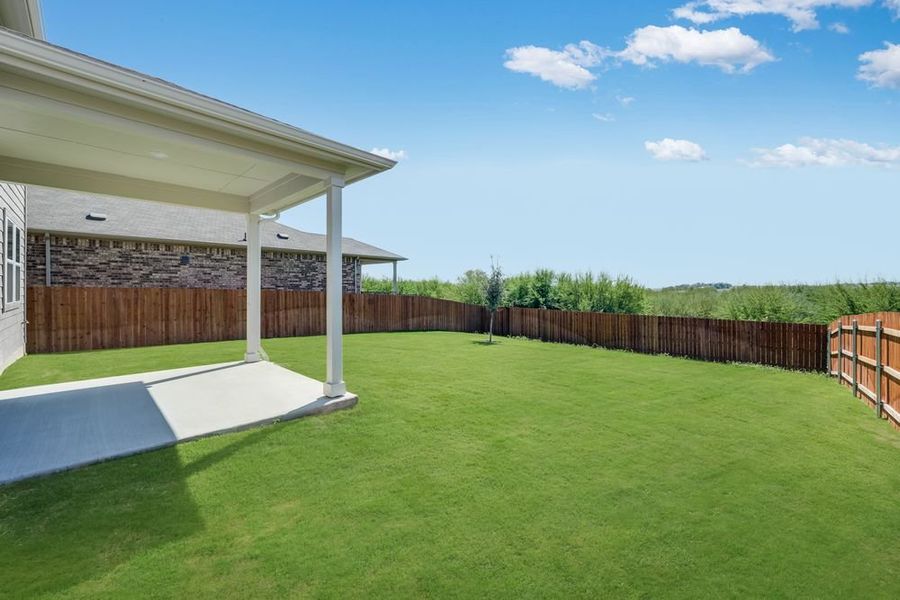 Exterior details and patio area of a home in Lisso 50s, Pflugerville (Image 3).