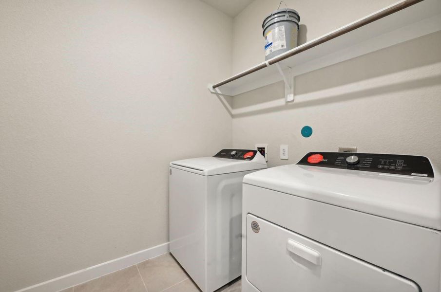 Nice utility room with washer and dryer provided by the landlord
