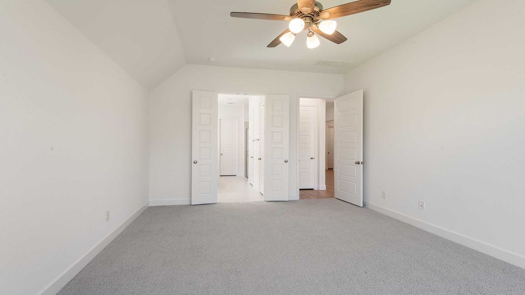 Representative unfurnished interior of a home built from the 2187W by Perry Homes in 6 Creeks 50', Kyle (Image 16).