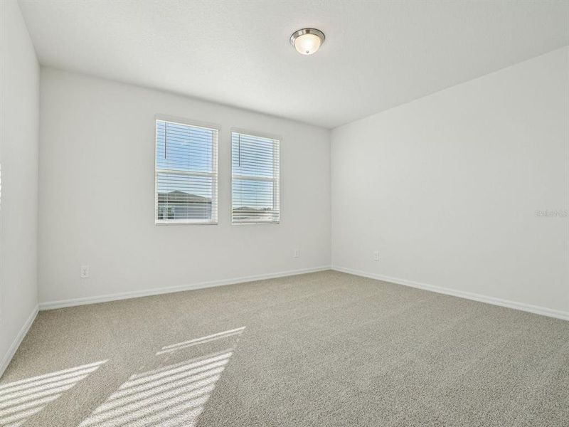 Spacious, unfurnished interior of a new home in The Meadow at Crossprairie Bungalows, St. Cloud (Image 10).