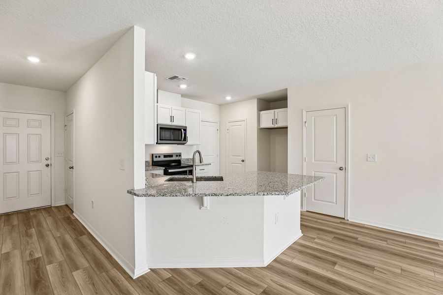 Furnished interior view inside a new home in Reserve at Forest Lake Townhomes, Lake Wales (Image 6). Furnished interior view inside a new home in Reserve at Forest Lake Townhomes, Lake Wales (Image 6).