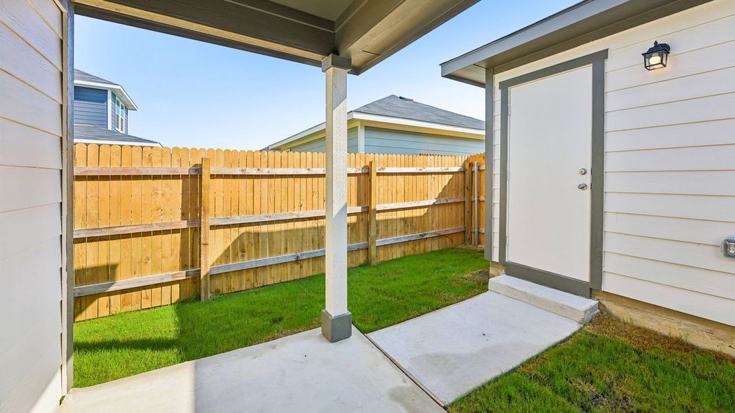 Exterior details and patio area of a home in Valverde, Bastrop (Image 19).