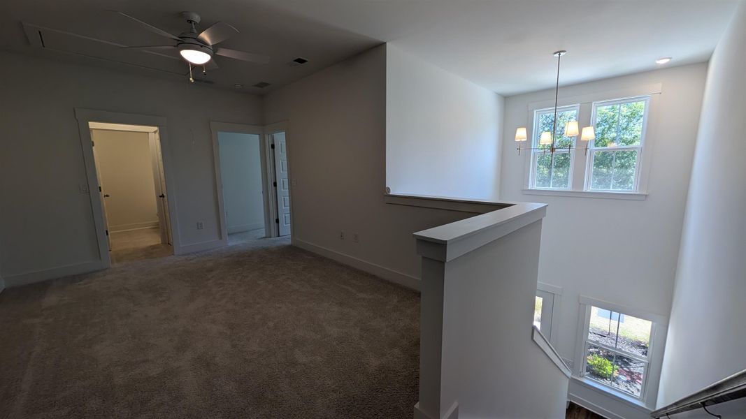 Spacious, unfurnished interior of a new home in Long Bay Golf Club, Longs (Image 29).