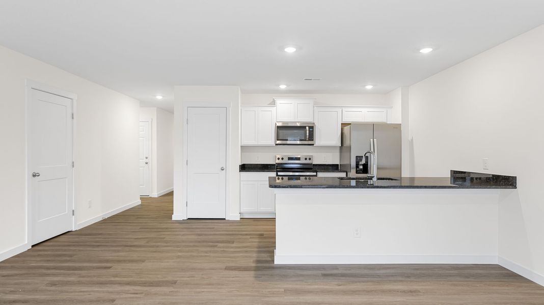 Representative furnished interior of a home built from the Freeport by D.R. Horton in Owensby Farms, Dayton (Image 6).