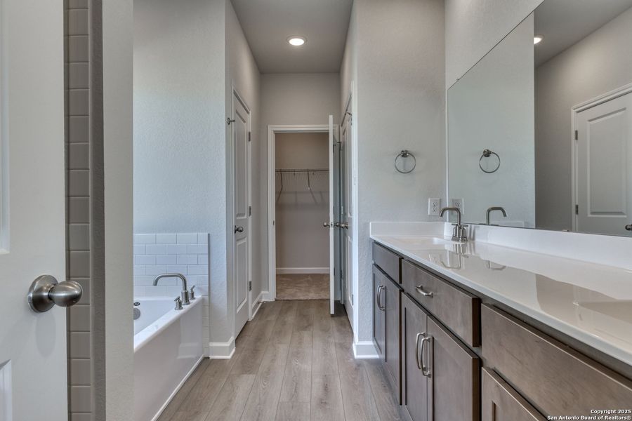 Furnished interior view inside a new home in Enclave at Hennersby Hollow 50's, San Antonio (Image 9). Furnished interior view inside a new home in Enclave at Hennersby Hollow 50's, San Antonio (Image 9).