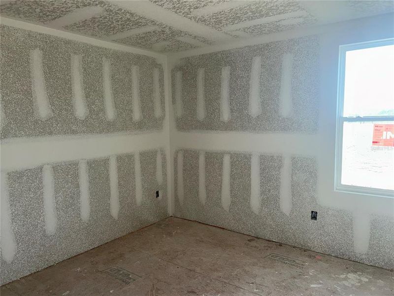 In-progress construction of a new home in Oakfield Trails Signature, Parrish, FL (Image 10).