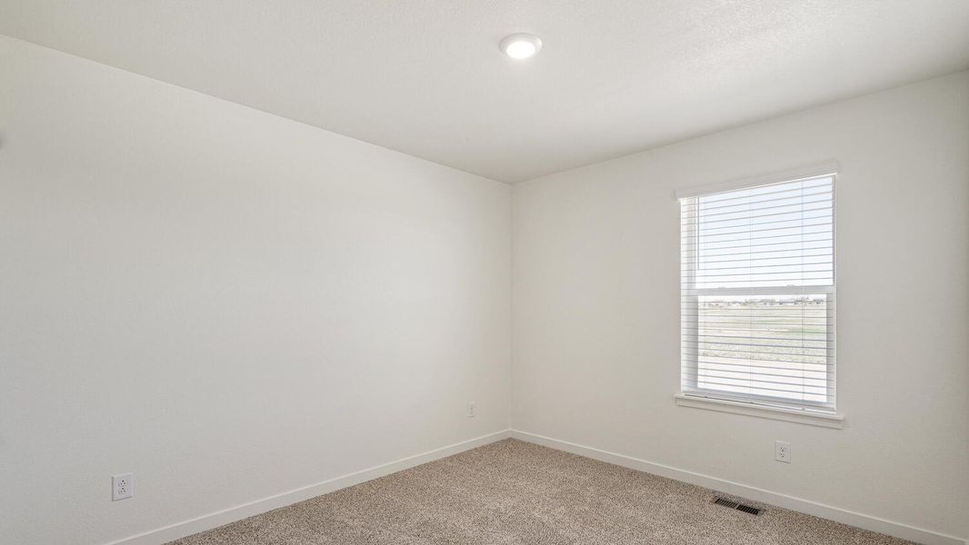 Spacious, unfurnished interior of a new home in Silver Peaks, Lochbuie (Image 25).