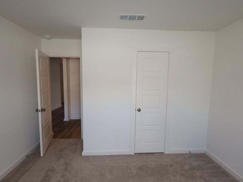 Spacious, unfurnished interior of a new home in Pinewood at Grand Texas, New Caney (Image 21). Spacious, unfurnished interior of a new home in Pinewood at Grand Texas, New Caney (Image 21).