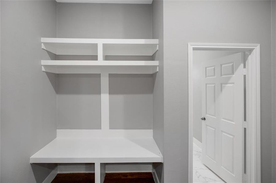 Mudroom with light marble finish floors Mudroom with light marble finish floors