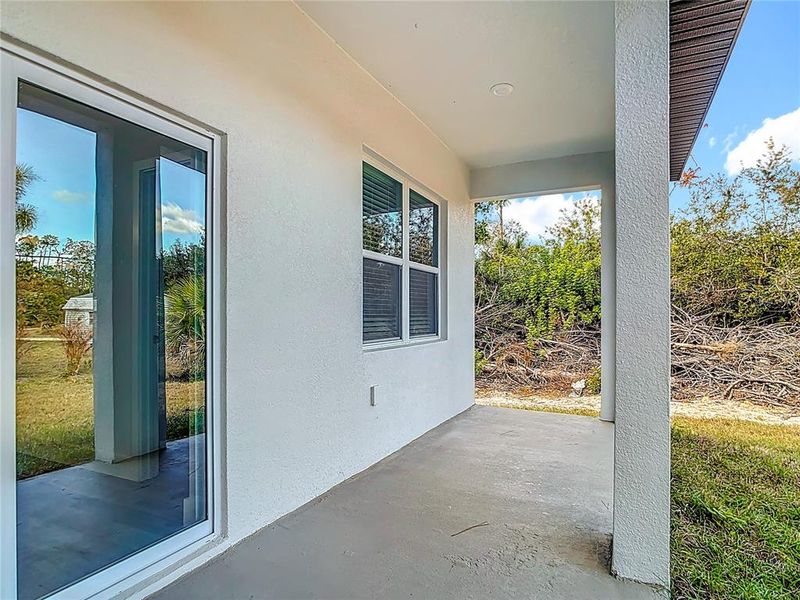 Exterior details and patio area of a home in , Port Charlotte (Image 3).