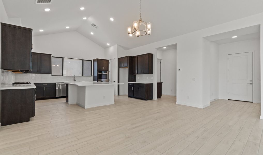 Vaulted ceiling unites main living areas Vaulted ceiling unites main living areas