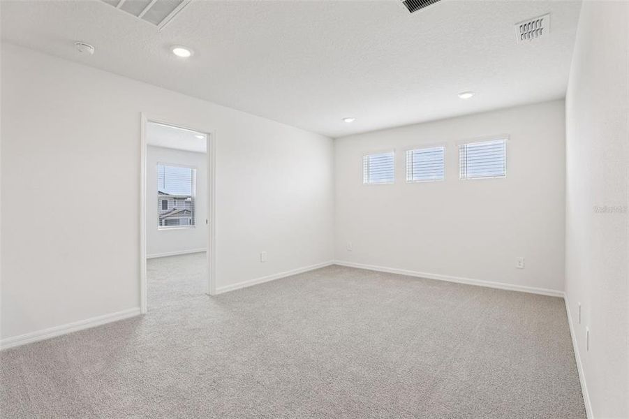 Spacious, unfurnished interior of a new home in The Meadow at Crossprairie, St. Cloud (Image 22).