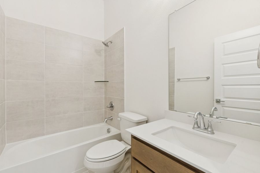 Bathroom in the Gilmour II home plan by Trophy Signature Homes – REPRESENTATIVE PHOTO Bathroom in the Gilmour II home plan by Trophy Signature Homes – REPRESENTATIVE PHOTO