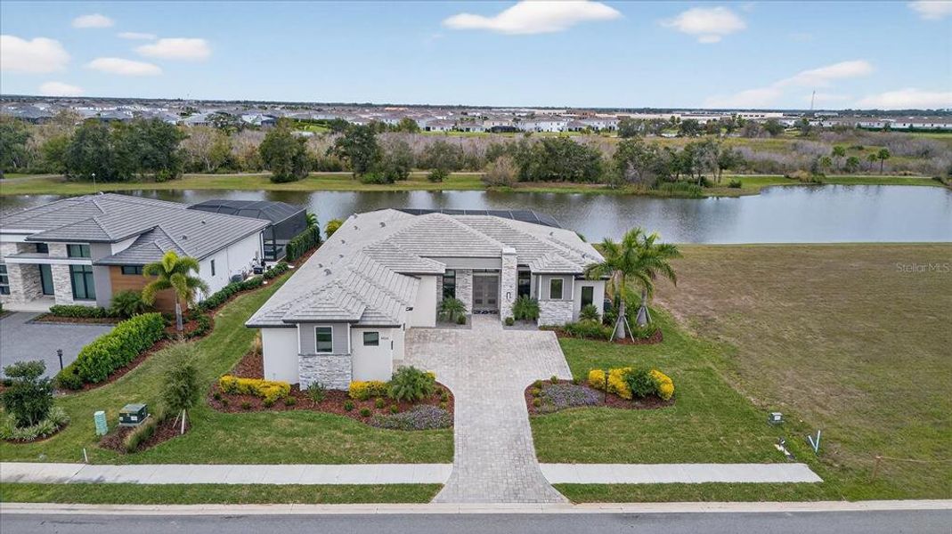 Front exterior of a new home in , Bradenton, FL, highlighting curb appeal (Image 29).
