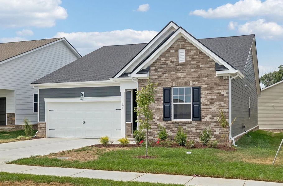 Front exterior of a new home in Cedars at Cane Ridge | 55+ Community, Antioch, TN, highlighting curb appeal (Image 22).