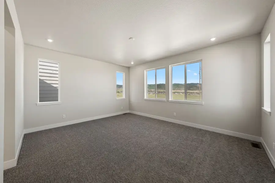 Spacious, unfurnished interior of a new home in Trumark Homes at Sterling Ranch, Littleton (Image 23).