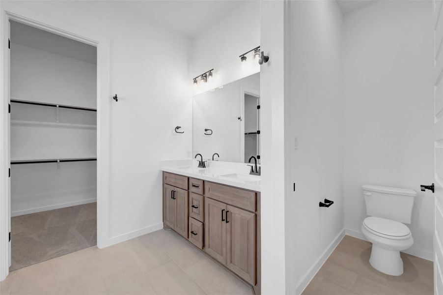 Furnished interior view inside a new home in Heritage, Dripping Springs (Image 5).