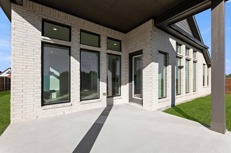 Exterior details and patio area of a home in BridgeWater - Phase 1, Midlothian (Image 26). Exterior details and patio area of a home in BridgeWater - Phase 1, Midlothian (Image 26).