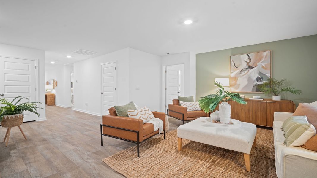 Representative furnished interior of a home built from the Freeport by D.R. Horton in Palm Ridge, Guyton (Image 11).