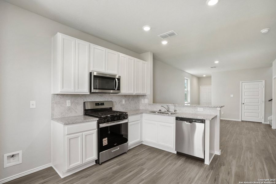 Furnished interior view inside a new home in Blue Ridge Ranch, San Antonio (Image 8).