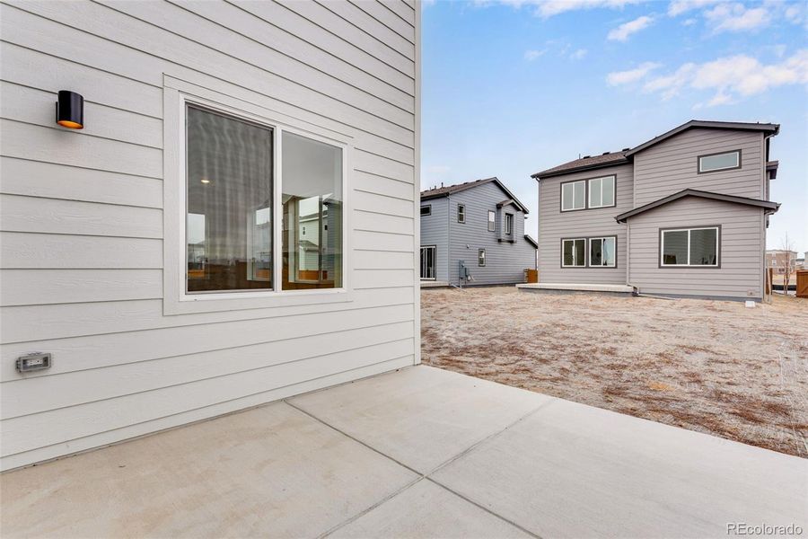 Exterior details and patio area of a home in Reunion, Commerce City (Image 3).