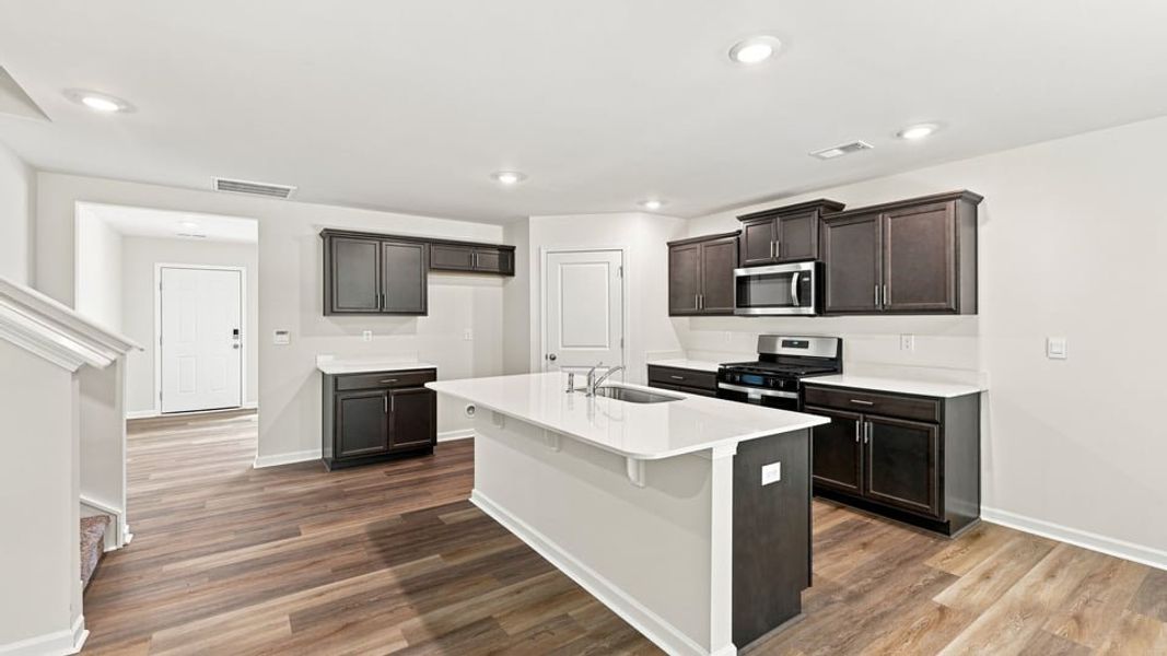 Furnished interior view inside a new home in Bentley Park, Greenwood (Image 7).