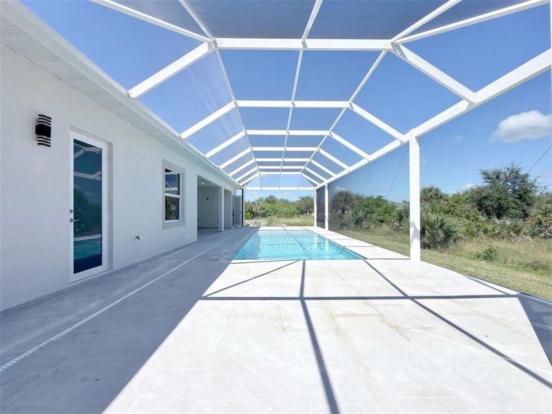 Exterior details and patio area of a home in , Port Charlotte (Image 27).