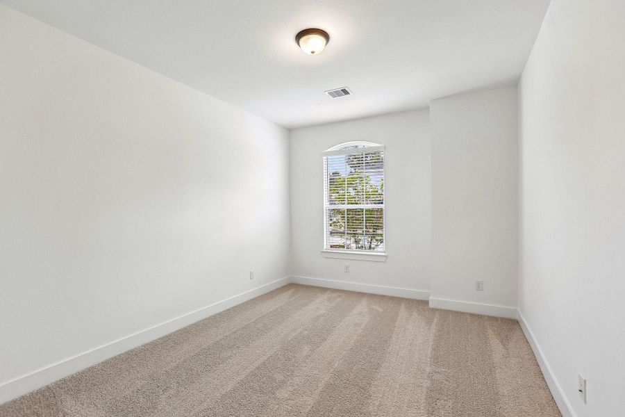 Spacious, unfurnished interior of a new home in The Highlands, Porter (Image 31).