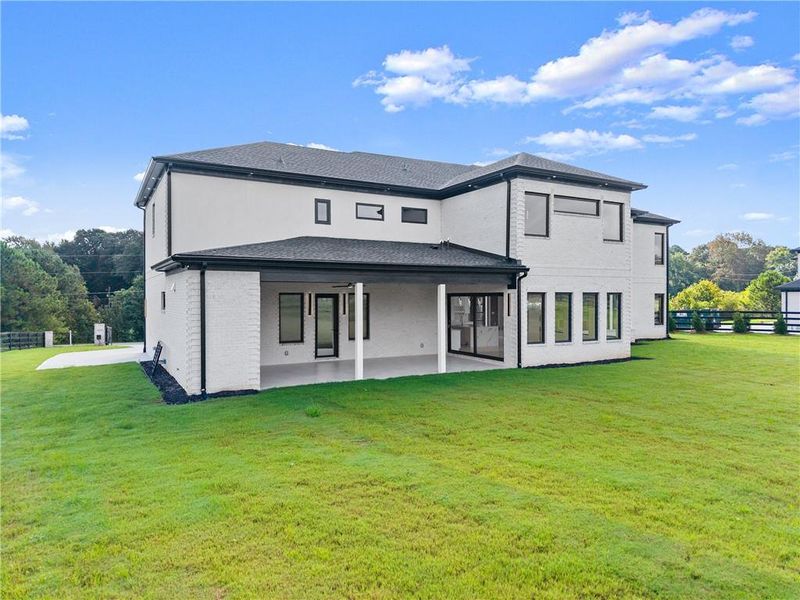 Front exterior of a new home in , Dacula, GA, highlighting curb appeal (Image 28).