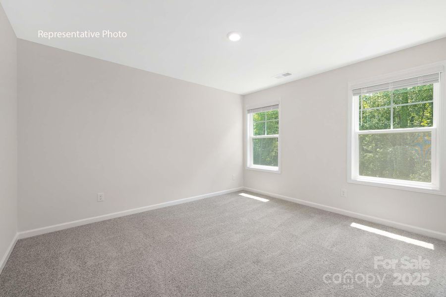 Spacious, unfurnished interior of a new home in Sanctuary at Southgate, Indian Trail (Image 20).