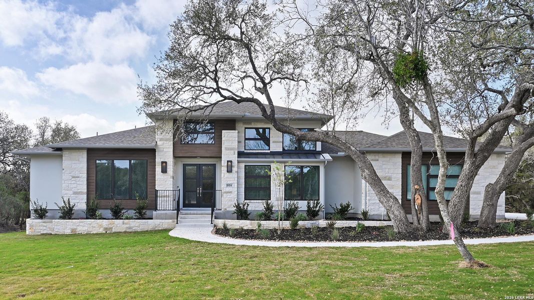 Front exterior of a new home in Thornebrook, Bulverde, TX, highlighting curb appeal (Image 22).