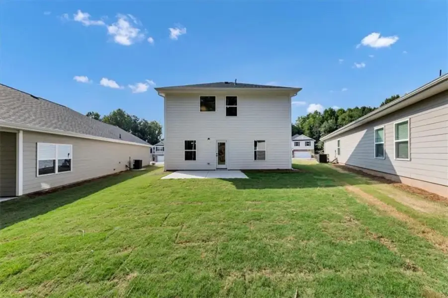 Exterior details and patio area of a home in Canterbury Villas, Carrollton (Image 21).
